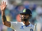 India's Virat Kohli waves to supporters as he walks off the field India's Virat Kohli waves to supporters as he walks off the field
