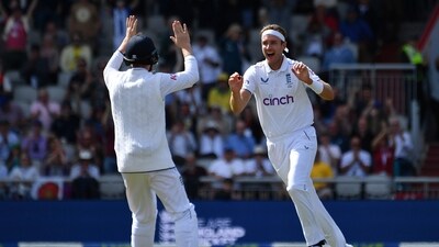 England's Stuart Broad, right, celebrates the dismissal of Australia's Travis Head (AP) England's Stuart Broad, right, celebrates the dismissal of Australia's Travis Head (AP)