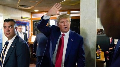 CORRECTS CITY AND LOCATION - Former President Donald Trump waves as he departs after a visit with campaign volunteers at the Elks Lodge, Tuesday, July 18, 2023, in Cedar Rapids, Iowa. (AP Photo/Charlie Neibergall) (AP) CORRECTS CITY AND LOCATION - Former President Donald Trump waves as he departs after a visit with campaign volunteers at the Elks Lodge, Tuesday, July 18, 2023, in Cedar Rapids, Iowa. (AP Photo/Charlie Neibergall) (AP)