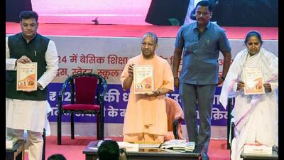 Chief minister Yogi Adityanath with UP minister of state (independent charge) primary education Sandeep Singh and state secondary education minister (independent charge) Gulab Devi at the inauguration of various projects for students studying in schools of the Basic and Secondary Education Council in the session 2023-24, in Lucknow on Wednesday. (ANI Photo) Chief minister Yogi Adityanath with UP minister of state (independent charge) primary education Sandeep Singh and state secondary education minister (independent charge) Gulab Devi at the inauguration of various projects for students studying in schools of the Basic and Secondary Education Council in the session 2023-24, in Lucknow on Wednesday. (ANI Photo)