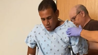 Chris Pospisil was attacked by a shark while he and his friend were surfing at New Smyrna Beach (GoFundMe) Chris Pospisil was attacked by a shark while he and his friend were surfing at New Smyrna Beach (GoFundMe)