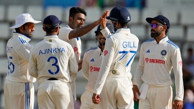 India's Virat Kohli, left, and keeper Ishan Kishan celebrates the dismissal of West Indies' Tagenarine Chanderpaul (AP) India's Virat Kohli, left, and keeper Ishan Kishan celebrates the dismissal of West Indies' Tagenarine Chanderpaul (AP)