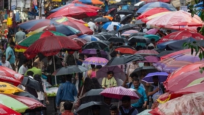 People dealing with heavy rain at Dadar TT, in Mumbai, India, on Tuesday, July 18, 2023. (Anshuman Poyrekar/Hindustan Times) People dealing with heavy rain at Dadar TT, in Mumbai, India, on Tuesday, July 18, 2023. (Anshuman Poyrekar/Hindustan Times)