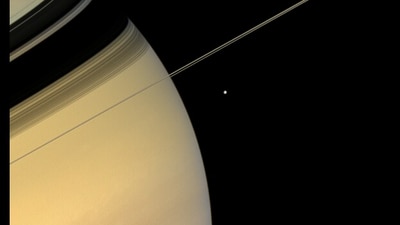 NASA captures Saturn and its moon together. (Instagram/@Nasa)