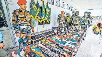 Teams recovered four AK series assault rifles, eight magazines, 196 rounds, two 9 mm pistols and ammunition from the spot in Poonch’s Surankote (PTI) Teams recovered four AK series assault rifles, eight magazines, 196 rounds, two 9 mm pistols and ammunition from the spot in Poonch’s Surankote (PTI)