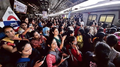 Thane, India - July, 19, 2023: after heavy rain As the local train is running late, there is a rush of commuters at the Thane railway station platform no 2 Ê, in Mumbai, India, on,Wednesday, July, 19, 2023. ( Praful Gangurde / HT Photo ) Thane, India - July, 19, 2023: after heavy rain As the local train is running late, there is a rush of commuters at the Thane railway station platform no 2 Ê, in Mumbai, India, on,Wednesday, July, 19, 2023. ( Praful Gangurde / HT Photo )