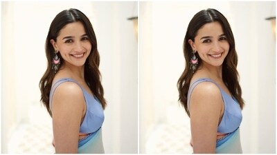 Alia looked stunning as ever in a multicoloured chiffon saree featuring shades of pink and blue. She teamed it with a sleeveless pastel blue blouse. (Instagram/@aliaabhatt) Alia looked stunning as ever in a multicoloured chiffon saree featuring shades of pink and blue. She teamed it with a sleeveless pastel blue blouse. (Instagram/@aliaabhatt)