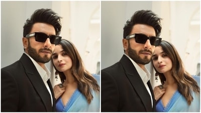 Ranveer looked dapper in a white shirt and a black suit, teamed with matching black formal trousers, and accessorised with tinted shades. (Instagram/@aliaabhatt) Ranveer looked dapper in a white shirt and a black suit, teamed with matching black formal trousers, and accessorised with tinted shades. (Instagram/@aliaabhatt)