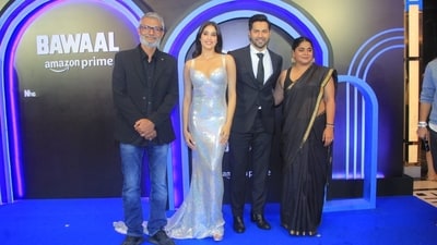 The Bawaal team at the special screening of the film in Mumbai on Tuesday. Black was the theme of the night for which director Nitesh Tiwari, story writer Ashwiny Iyer Tiwari and actor Varun Dhawan arrived in black. Janhvi Kapoor chose a hologram dress for the evening and truly caught the spotlight. The Bawaal team at the special screening of the film in Mumbai on Tuesday. Black was the theme of the night for which director Nitesh Tiwari, story writer Ashwiny Iyer Tiwari and actor Varun Dhawan arrived in black. Janhvi Kapoor chose a hologram dress for the evening and truly caught the spotlight. 