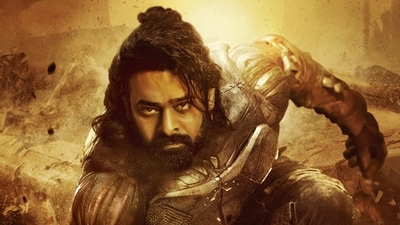 Prabhas sports long hair and a beard in the first look of Project K. Prabhas sports long hair and a beard in the first look of Project K.