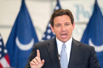 Florida Governor and Republican presidential candidate Ron DeSantis speaks during a press conference at the Celebrate Freedom Foundation Hangar in West Columbia, S.C. July 18, 2023. For DeSantis, Tuesday was supposed to mark a major moment to help reset his stagnant Republican presidential campaign. But yet again, the moment was overshadowed by Donald Trump. The former president was the overwhelming focus for much of the day as DeSantis spoke out at a press conference and sat for a highly anticipated interview designed to reassure anxious donors and primary voters that he's still well-positioned to defeat Trump.(AP Photo/Sean Rayford) (AP) Florida Governor and Republican presidential candidate Ron DeSantis speaks during a press conference at the Celebrate Freedom Foundation Hangar in West Columbia, S.C. July 18, 2023. For DeSantis, Tuesday was supposed to mark a major moment to help reset his stagnant Republican presidential campaign. But yet again, the moment was overshadowed by Donald Trump. The former president was the overwhelming focus for much of the day as DeSantis spoke out at a press conference and sat for a highly anticipated interview designed to reassure anxious donors and primary voters that he's still well-positioned to defeat Trump.(AP Photo/Sean Rayford) (AP)