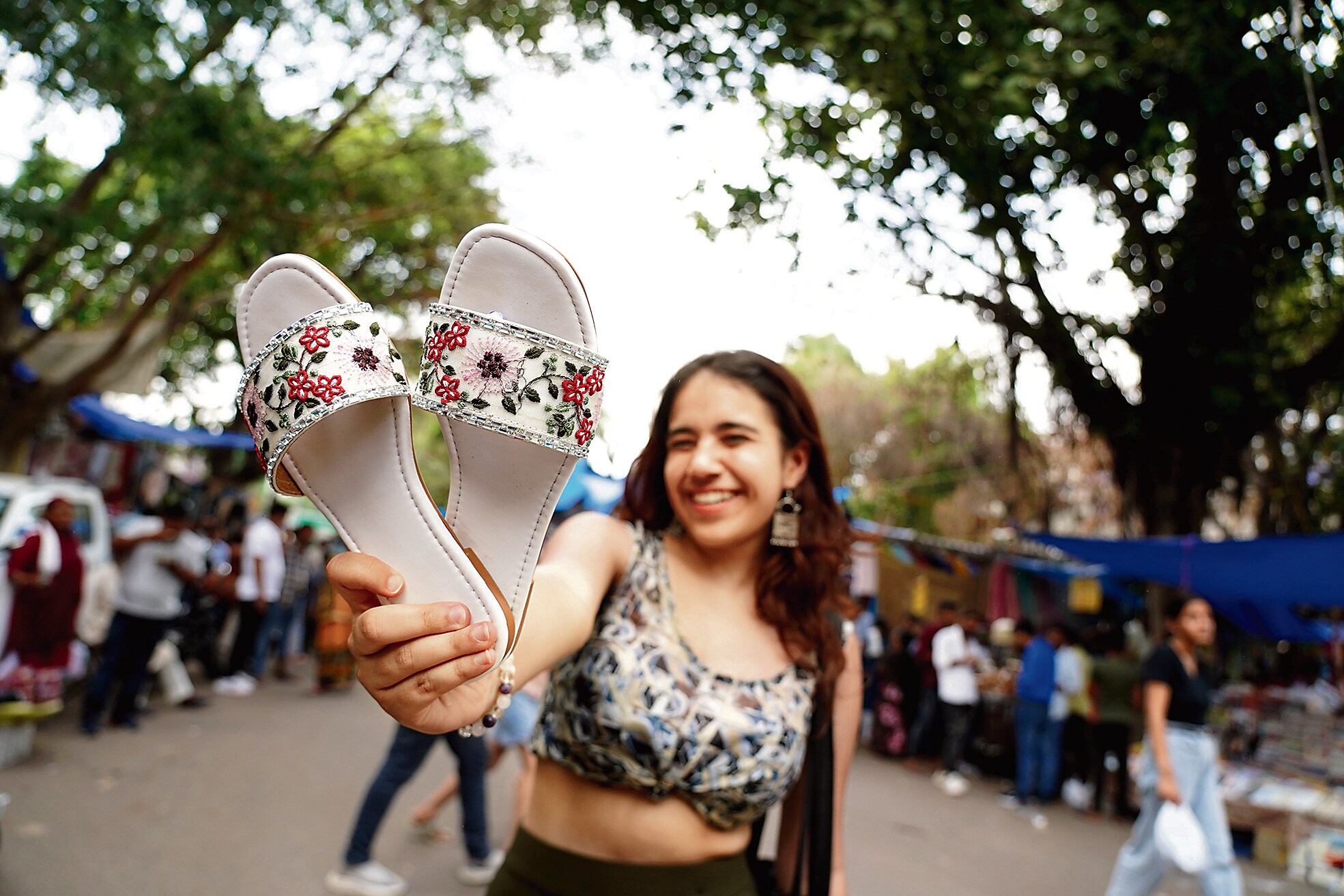 Saakhi Sadh, a student of JMC, opts for white flats from Sarojini Nagar. (Photo: Gokul VS/HT) Saakhi Sadh, a student of JMC, opts for white flats from Sarojini Nagar. (Photo: Gokul VS/HT)