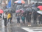 Heavy rains lashed Mumbai and adjoining areas, disrupting suburban rail traffic and causing water-logging in low-lying areas. Heavy rains lashed Mumbai and adjoining areas, disrupting suburban rail traffic and causing water-logging in low-lying areas.