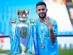 Manchester City's Riyad Mahrez celebrates Premier League title in May 2023