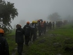 Rescuers walk towards the site of a landslide in Raigad district, western Maharashtra state, India, Thursday, July 20, 2023. (AP) Rescuers walk towards the site of a landslide in Raigad district, western Maharashtra state, India, Thursday, July 20, 2023. (AP)