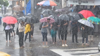 Heavy rains lashed Mumbai and adjoining areas on Wednesday, disrupting suburban rail traffic and causing water-logging in low-lying areas. (HT Photo/Bhushan Koyande) Heavy rains lashed Mumbai and adjoining areas on Wednesday, disrupting suburban rail traffic and causing water-logging in low-lying areas. (HT Photo/Bhushan Koyande)