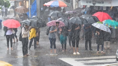 Heavy rains lashed Mumbai and adjoining areas, disrupting suburban rail traffic and causing water-logging in low-lying areas. (HT Photo/Bhushan Koyande) Heavy rains lashed Mumbai and adjoining areas, disrupting suburban rail traffic and causing water-logging in low-lying areas. (HT Photo/Bhushan Koyande)