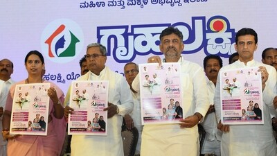 Karnataka Chief Minister Siddaramaiah with Deputy CM DK Shivakumar, Minister Laxmi Hebbalkar and others launch 'Gruha Laxmi' scheme at Vidhana Soudha in Bengaluru on Wednesday. (ANI Photo) (Shashidhar Byrappa) Karnataka Chief Minister Siddaramaiah with Deputy CM DK Shivakumar, Minister Laxmi Hebbalkar and others launch 'Gruha Laxmi' scheme at Vidhana Soudha in Bengaluru on Wednesday. (ANI Photo) (Shashidhar Byrappa)