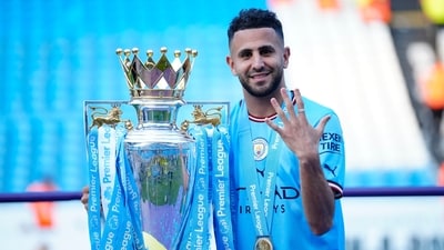 Manchester City's Riyad Mahrez celebrates Premier League title in May 2023 (AP)