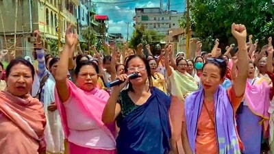 Women protesting in Imphal on Thursday after the video of assault on Kuki women went viral. (PTI)