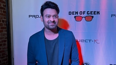 Solo pictures of Prabhas looking dapper in blue and black at the event were shared on fan pages. Moreover, ahead of the first glimpse of Project K at the San Diego Comic-Con, the first look of Prabhas from the film was unveiled on Wednesday. Amid backlash, it was later deleted by the makers and replaced with a new, but similar poster. Solo pictures of Prabhas looking dapper in blue and black at the event were shared on fan pages. Moreover, ahead of the first glimpse of Project K at the San Diego Comic-Con, the first look of Prabhas from the film was unveiled on Wednesday. Amid backlash, it was later deleted by the makers and replaced with a new, but similar poster. 