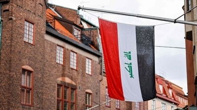 The Iraqi flag hangs outside Iraq's embassy in Stockholm, Sweden as police make preparations for a demonstrationon July 20, 2023. (AFP) The Iraqi flag hangs outside Iraq's embassy in Stockholm, Sweden as police make preparations for a demonstrationon July 20, 2023. (AFP)