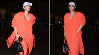 Sonam Kapoor wears a maxi dress, sneakers, and a baseball cap to the airport. (HT Photo/Varinder Chawla) Sonam Kapoor wears a maxi dress, sneakers, and a baseball cap to the airport. (HT Photo/Varinder Chawla)