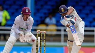 Rohit fell to Jomel Worrican on 80 as India lost four wickets in the second session. (AP) Rohit fell to Jomel Worrican on 80 as India lost four wickets in the second session. (AP)