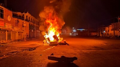 Tyres and construction materials set on fire by miscreants amid ongoing ethnic violence in Manipur, in Imphal East district, Friday. (PTI) (HT_PRINT) Tyres and construction materials set on fire by miscreants amid ongoing ethnic violence in Manipur, in Imphal East district, Friday. (PTI) (HT_PRINT)