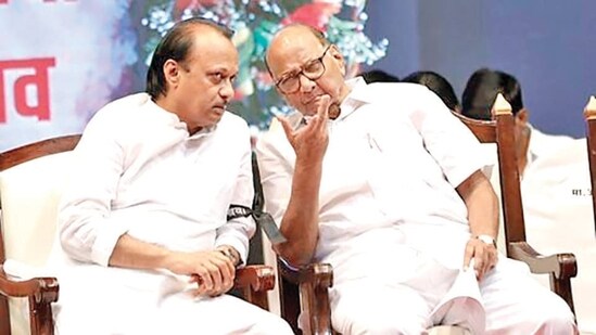 Nationalist Congress Party leaders Ajit Pawar (left) and Sharad Pawar (Rahul Raut/HT Photo)