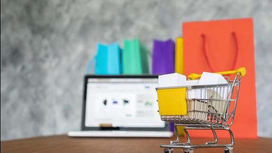 laptop and shopping bags, online shopping concept.