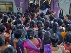 After heavy rain, as the local train is running late, there is a rush of commuters at the Thane railway station in Mumbai. (PTI)