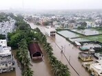 An aerial view of the flooded Sutrapada city after heavy rainfall, in Gir Somnath on Thursday. An aerial view of the flooded Sutrapada city after heavy rainfall, in Gir Somnath on Thursday.