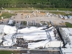 Debris is scattered around the Pfizer facility on Wednesday in Rocky Mount, N.C., after damage from severe weather. 
