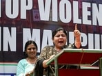 Netta D'souza, president of All India Mahila Congress seen addressing the gathering during a protest against the alleged Violence in Manipur at Jantar Mantar in New Delhi, India, (Sanchit Khanna/Hindustan Times)