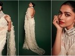 Deepika Padukone attended the Manish Malhotra Bridal Couture Show in a gorgeous white saree and mirror-work backless blouse. Deepika Padukone attended the Manish Malhotra Bridal Couture Show in a gorgeous white saree and mirror-work backless blouse.