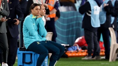 Australia's forward #20 Sam Kerr (L) observes from the sidelines after being ruled out from the Australia and New Zealand 2023 Women's World Cup Group B football match between Australia and Ireland (AFP) Australia's forward #20 Sam Kerr (L) observes from the sidelines after being ruled out from the Australia and New Zealand 2023 Women's World Cup Group B football match between Australia and Ireland (AFP)