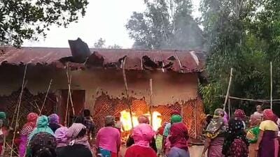 Houses were burnt in Manipur on Friday. (AFP) Houses were burnt in Manipur on Friday. (AFP)