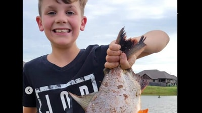 Young angler in the US catches fish with human-like teeth. (Instagram/@Oklahoma Department of Wildlife Conservation) Young angler in the US catches fish with human-like teeth. (Instagram/@Oklahoma Department of Wildlife Conservation)