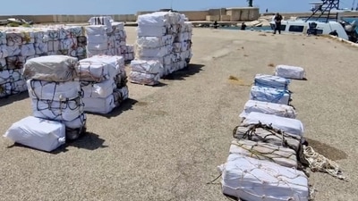 Packages containing cocaine seized during a police operation, lie on a dock in the harbour of Porto Empedocle, Italy.. (via REUTERS)