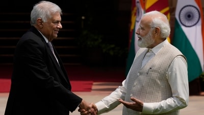 PM Modi welcomes Wickremesinghe before their delegation level meeting in New Delhi. (AP) PM Modi welcomes Wickremesinghe before their delegation level meeting in New Delhi. (AP)