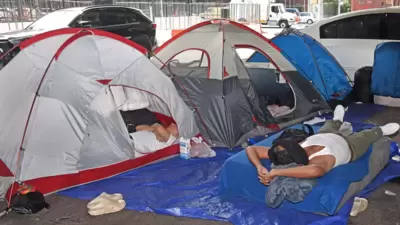A mini tent city has appeared under the Brooklyn-Queens Expressway raising concerns about the fate of migrants booted from the city's newest mega shelters. (Gregory P. Mango) A mini tent city has appeared under the Brooklyn-Queens Expressway raising concerns about the fate of migrants booted from the city's newest mega shelters. (Gregory P. Mango)