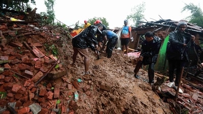 "12 bodies have been retrieved from the debris in Irshalwadi, Raigad; also, one rescuer died of cardiac arrest. Total of 13 deaths till now," police said on Thursday. (HT Photo) "12 bodies have been retrieved from the debris in Irshalwadi, Raigad; also, one rescuer died of cardiac arrest. Total of 13 deaths till now," police said on Thursday. (HT Photo)