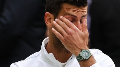 Serbia's Novak Djokovic reacts to his defeat by Spain's Carlos Alcaraz during their men's singles final tennis match on the last day of the 2023 Wimbledon Championships (AFP)