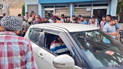 The bullet-riddled car of the victims. While one is critical after getting shot in the chest, the other suffered a bullet wound in the thigh. (HT Photo) The bullet-riddled car of the victims. While one is critical after getting shot in the chest, the other suffered a bullet wound in the thigh. (HT Photo)