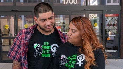 Samantha Casiano and Luis Villasana stand outside the courtroom at the Travis County Courthouse in Austin, Texas on July 19, 2023. A Texas state court will hear arguments from both sides in Zurawski v. State of Texas, a lawsuit filed by the Center for Reproductive Rights on behalf of thirteen Texas women denied abortions despite serious pregnancy complications. (Photo by SUZANNE CORDEIRO / AFP) (AFP) Samantha Casiano and Luis Villasana stand outside the courtroom at the Travis County Courthouse in Austin, Texas on July 19, 2023. A Texas state court will hear arguments from both sides in Zurawski v. State of Texas, a lawsuit filed by the Center for Reproductive Rights on behalf of thirteen Texas women denied abortions despite serious pregnancy complications. (Photo by SUZANNE CORDEIRO / AFP) (AFP)