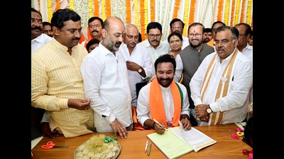 Union minister G Kishan Reddy takes charge as the Telangana Bharatiya Janata Party (BJP) president, in Hyderabad on Friday. (Bandi Sanjay Kumar Twitter) Union minister G Kishan Reddy takes charge as the Telangana Bharatiya Janata Party (BJP) president, in Hyderabad on Friday. (Bandi Sanjay Kumar Twitter)