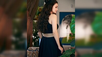 Dia Mirza's outfit features deep-cut sleeves with a high-neck body made in luxe jersey fabric. It also has side pockets and a centre-back long zip. (Instagram/@diamirza) Dia Mirza's outfit features deep-cut sleeves with a high-neck body made in luxe jersey fabric. It also has side pockets and a centre-back long zip. (Instagram/@diamirza)