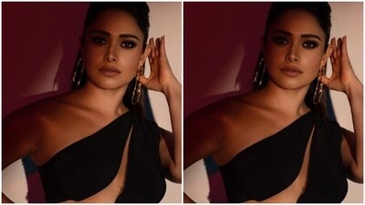 Assisted by makeup artist Shefali Sharma, Nushrratt decked up in golden eyeshadow, black eyeliner, black kohl, mascara-laden eyelashes, drawn eyebrows, contoured cheeks and a shade of nude lipstick. (Instagram/@nushrrattbharuccha) Assisted by makeup artist Shefali Sharma, Nushrratt decked up in golden eyeshadow, black eyeliner, black kohl, mascara-laden eyelashes, drawn eyebrows, contoured cheeks and a shade of nude lipstick. (Instagram/@nushrrattbharuccha)