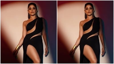 Nushrratt decked up in the black gown featuring one-shoulder details, cut-out meshed details at the torso and the waist, and a thigh high slit. (Instagram/@nushrrattbharuccha) Nushrratt decked up in the black gown featuring one-shoulder details, cut-out meshed details at the torso and the waist, and a thigh high slit. (Instagram/@nushrrattbharuccha)